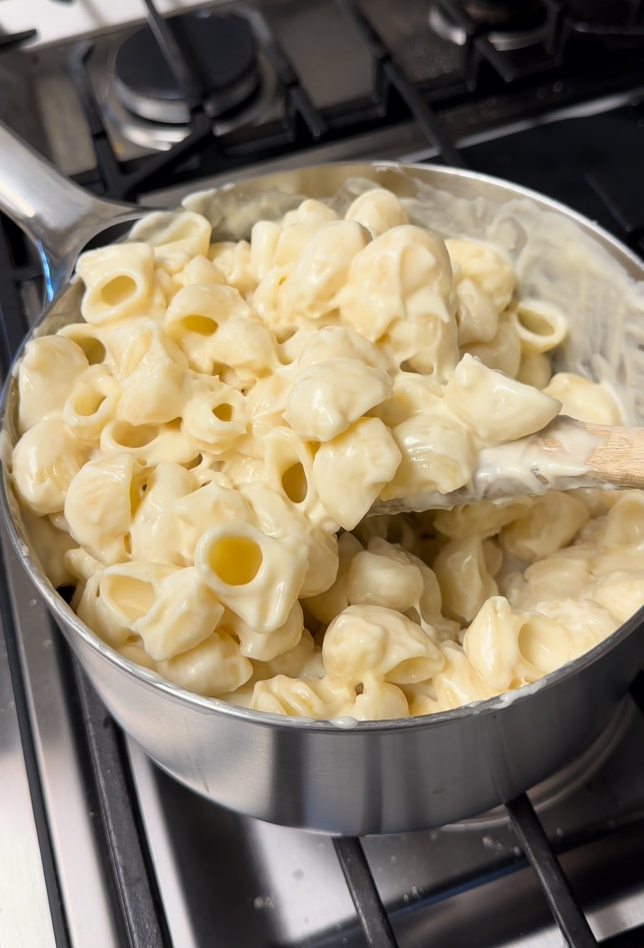 Creamy homemade mac and cheese made with grass fed butter, A2 milk, and freshly shredded raw cheddar — no seed oils or artificial dyes